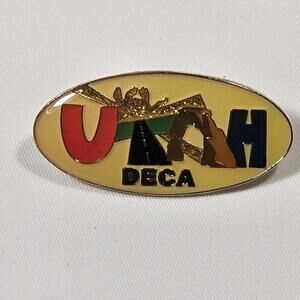 Vintage Utah DECA Gold Tone Enamel And Resin Lapel Pin. Arch Colorful